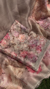 Soft Organza Saree in Subtle Pastel Shades Featuring All-Over Floral Digital Print and Intricate Sequins Embroidery with Designer Silver Zari Border – Perfect for Festive and Wedding Occasions
