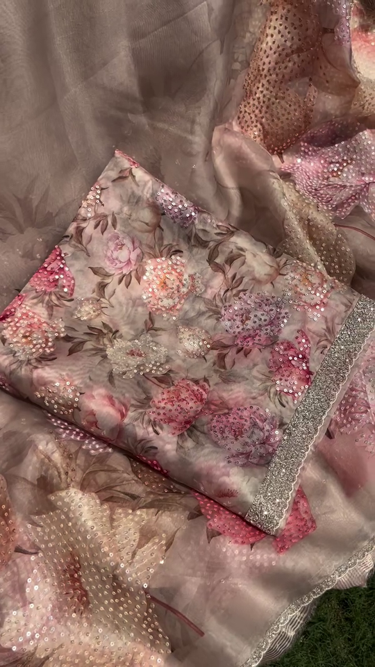 Soft Organza Saree in Subtle Pastel Shades Featuring All-Over Floral Digital Print and Intricate Sequins Embroidery with Designer Silver Zari Border – Perfect for Festive and Wedding Occasions