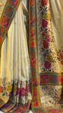 Elegant Cream Banarasi Silk Saree with Multicolor Floral Jaal Weaving, Rich Contrasting Zari Border, Traditional Pallu Design, and Intricate Meenakari Detailing Perfect for Festivals, Weddings, and Cultural Celebrations